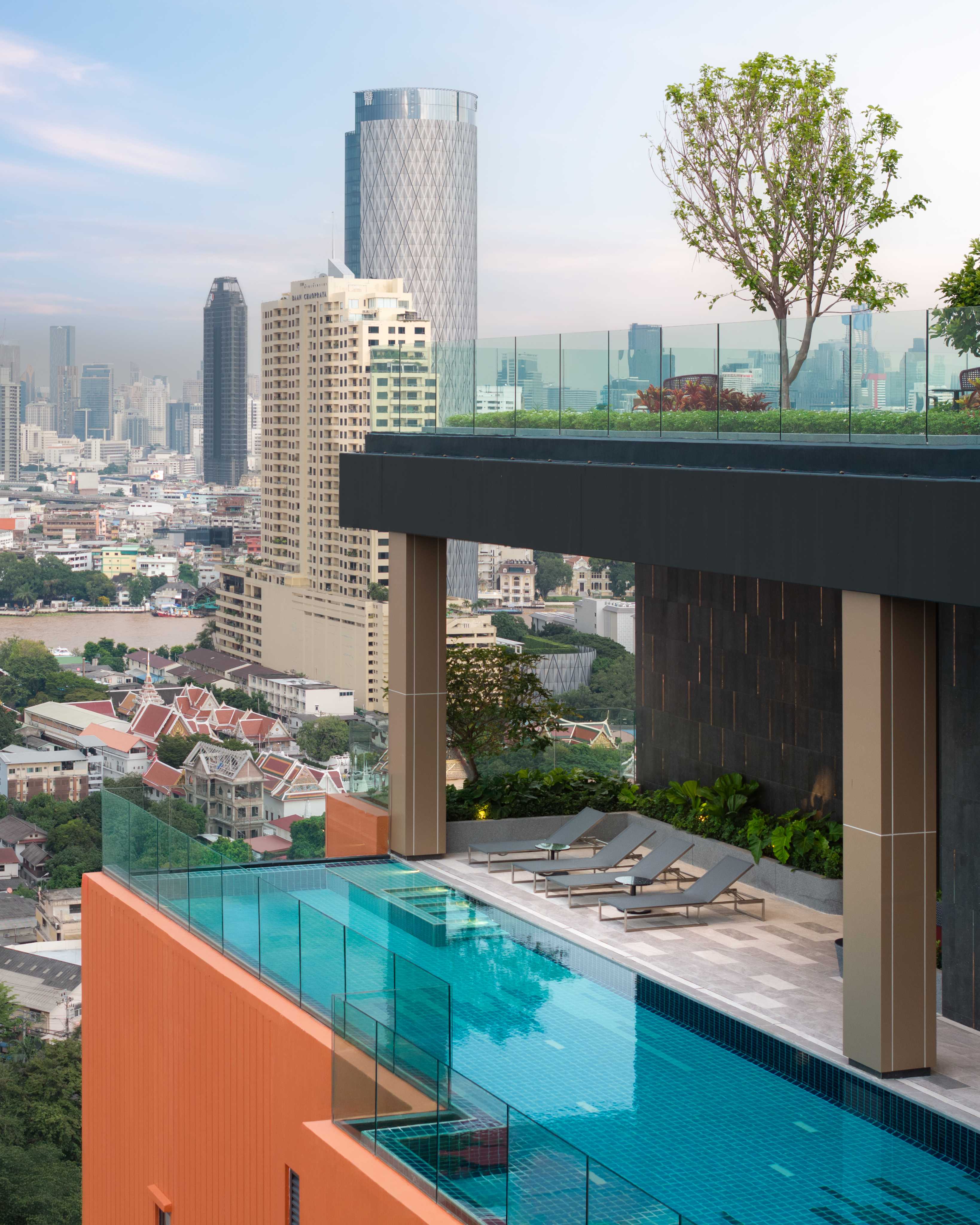Rooftop infinity pool and cityscape